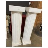 Two 42' tall plastic pillars w/ removable tops Two 42' tall plastic pillars w/ removable tops