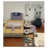 1991 Super Nintendo, Mario game, controls, more 1991 Super Nintendo, Mario game, controls, more