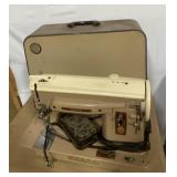 Singer sewing machine in case