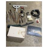 Sign, tools, cord more Sign, tools, cord more