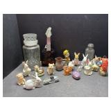 Jars, figurines, tootsie toy car, bottles, and