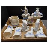 Box of vintage figurines and bells