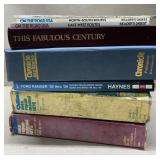 Assortment of books and Readers Digest maps