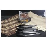 Kitchen lot including placemats. 4 tongs & more
