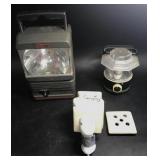 2 battery operated lanterns, 1 is a Coleman and a