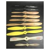 Model plane propellers. Some plastic, some wood