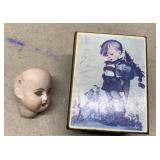 3x4 music box and porcelain doll head.