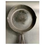 Vintage cast iron skillet marked 10SK
