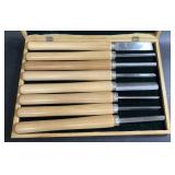 Box of wood handled wood carving tools