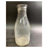 Milk bottle marked Pevely, St. Louis Missouri.