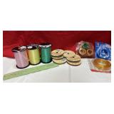 Lots of spool ribbon (various colors) and ruler