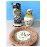 2 hand painted ceramic pitchers and plastic