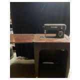 48x18x30 Kenmore Sewing Machine in nice wooden