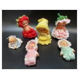 (6) Kewpie Dolls with knitted costumes