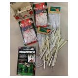 Assortment of light clips and ice cycles.