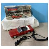 Classic red convertible telephone