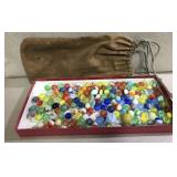 Vintage marbles with brown bag