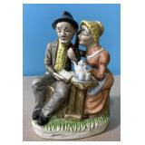 Figurine couple sitting together 7 inches
