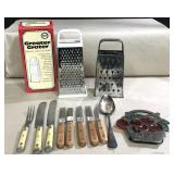 Two cheese graters, a set of Chicago Cutlery