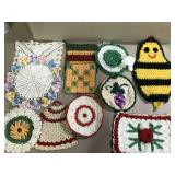 Lot of vintage doilies and pot holders