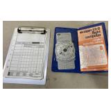Clip board and an apr E6-B flight computer Clip board and an apr E6-B flight computer