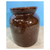 Vintage stoneware crock, has a small chip. 7' Vintage stoneware crock, has a small chip. 7'
