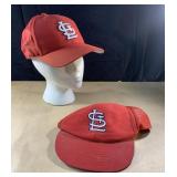 Two St. Louis Cardinals hats