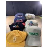 Eight advertising hats