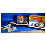 3 vintage cameras including a Kodak, and