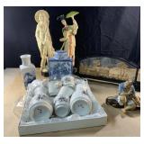 11-1/2 inch tall Asian statues, pottery, court