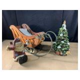 10" tall tree with Santa and a wooden sleigh