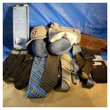 Lot of ties, a hat, travel pillow, and more