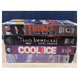Four VHS tapes, Tupac Shakur and Vanilla Ice