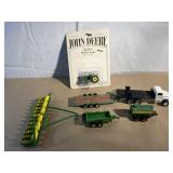 John Deere model tractors and attachments