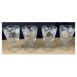 4 white and gold goblets with beautiful swirled