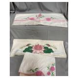 Vintage embroidered pillowcases and doilies