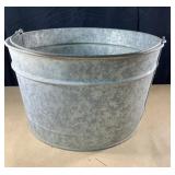 8" tall galvanized bucket with handle. No rust