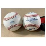 Two Rawlings practice balls