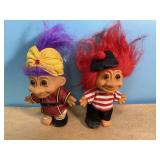 Two, Russ vintage trolls, both missing a shoe,