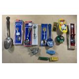 Vintage tin clacker toys, souvenir spoon and metal