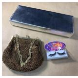 Vintage clutch purses and some fun eyelashes