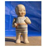 Antique ceramic doll with moving arms "Tommy"
