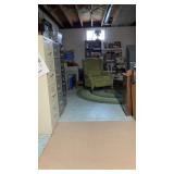Green high back chair with green fabric