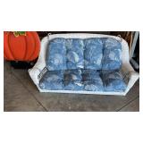 Faux Wicker Porch Swing with blue cushions