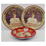 (2) Coca Cola Collectible Tin Trays & (1) Nut Bowl