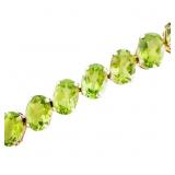 17.3 CTW Oval Cut Peridot Bracelet 14k Gold 7.5'