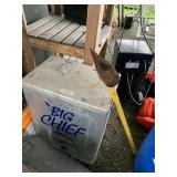 Big Chief smoker and a splitting maul with busted