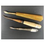 3 Antique cuticle pushers: 1 with ivory handle, 1
