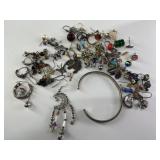 Large bag lot of assorted single earrings, many vi