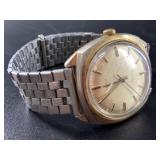 Vintage Timex Electric analog watch, with a stretc